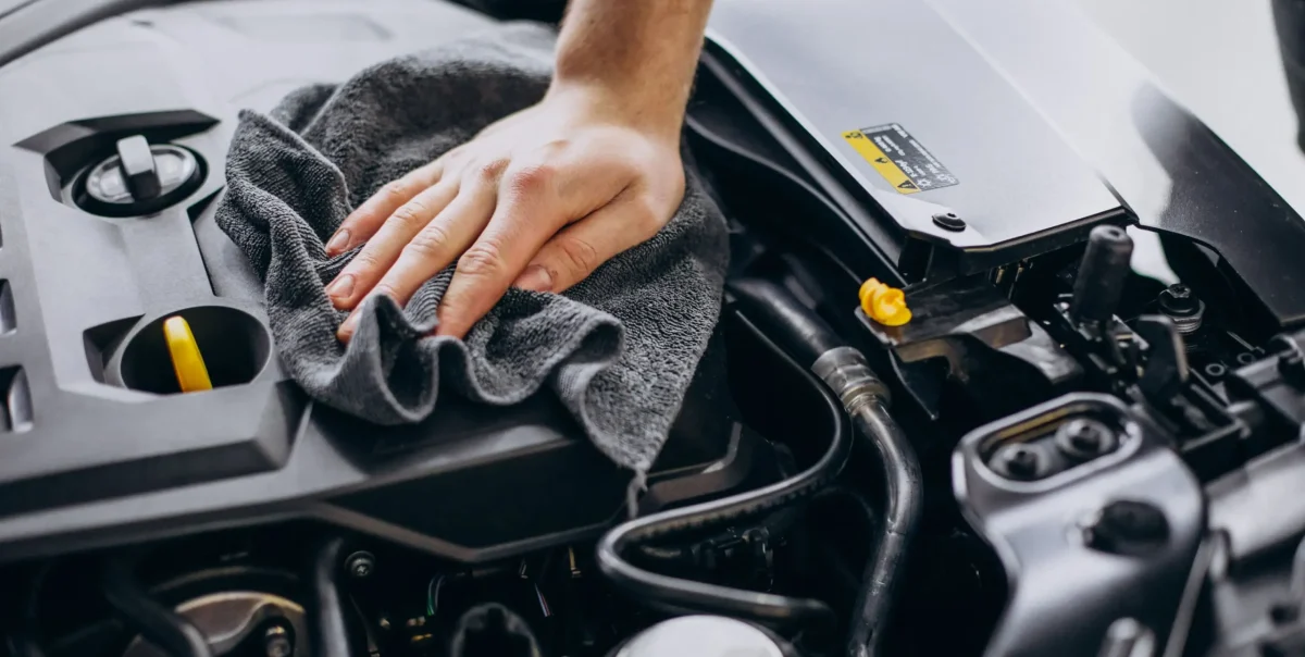 man-polishing-car-inside-car-service (1)