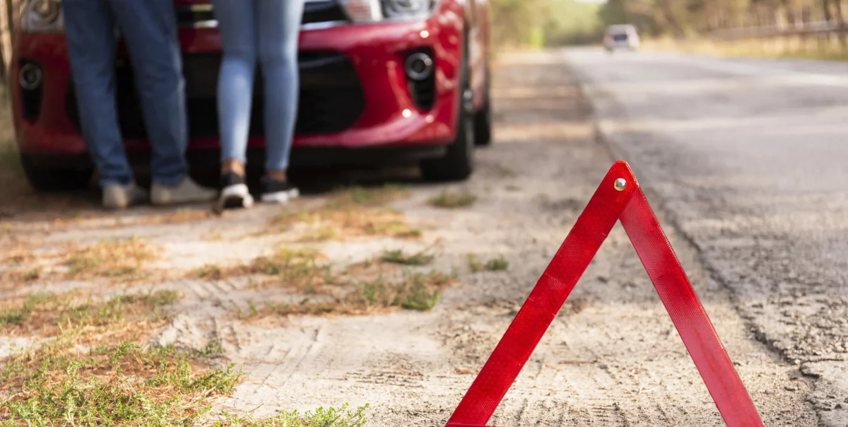 red-triangle-sign-road-car-problems-while-traveling (1)